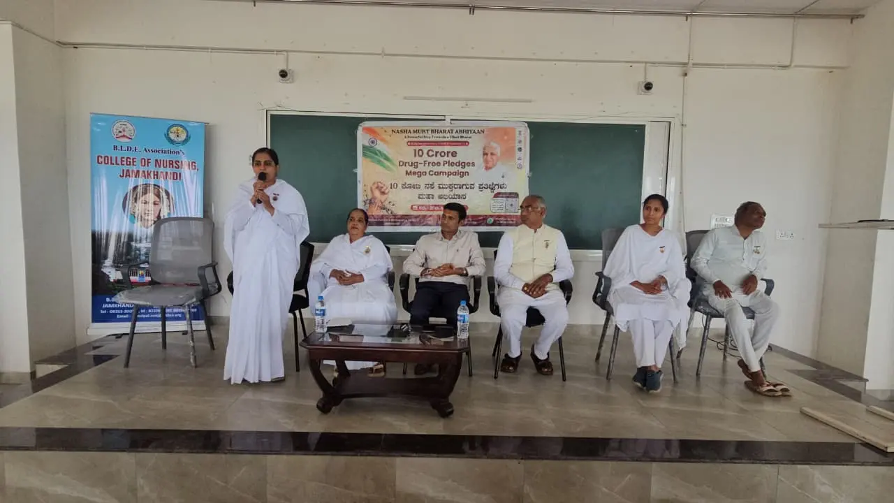 Nursing students and staff listening to Addiction Free Pledge Mega Campaign awareness session Jamkhandi College of Nursing