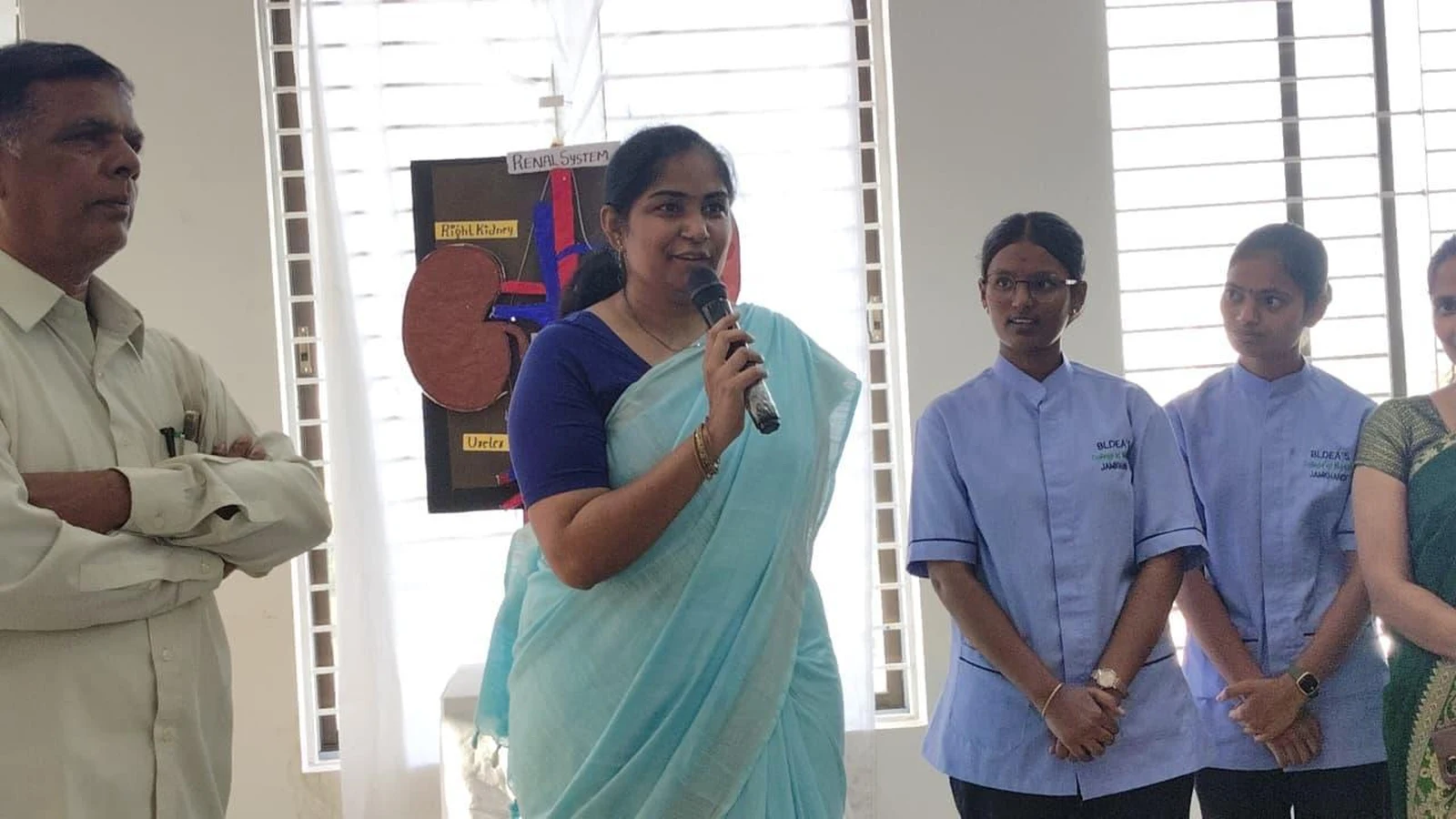 Dr. Sphurti Tungal addressing students and faculty at Anatomy Physiology Model Exhibition 2026 – BLDEA College of Nursing Jamkhandi