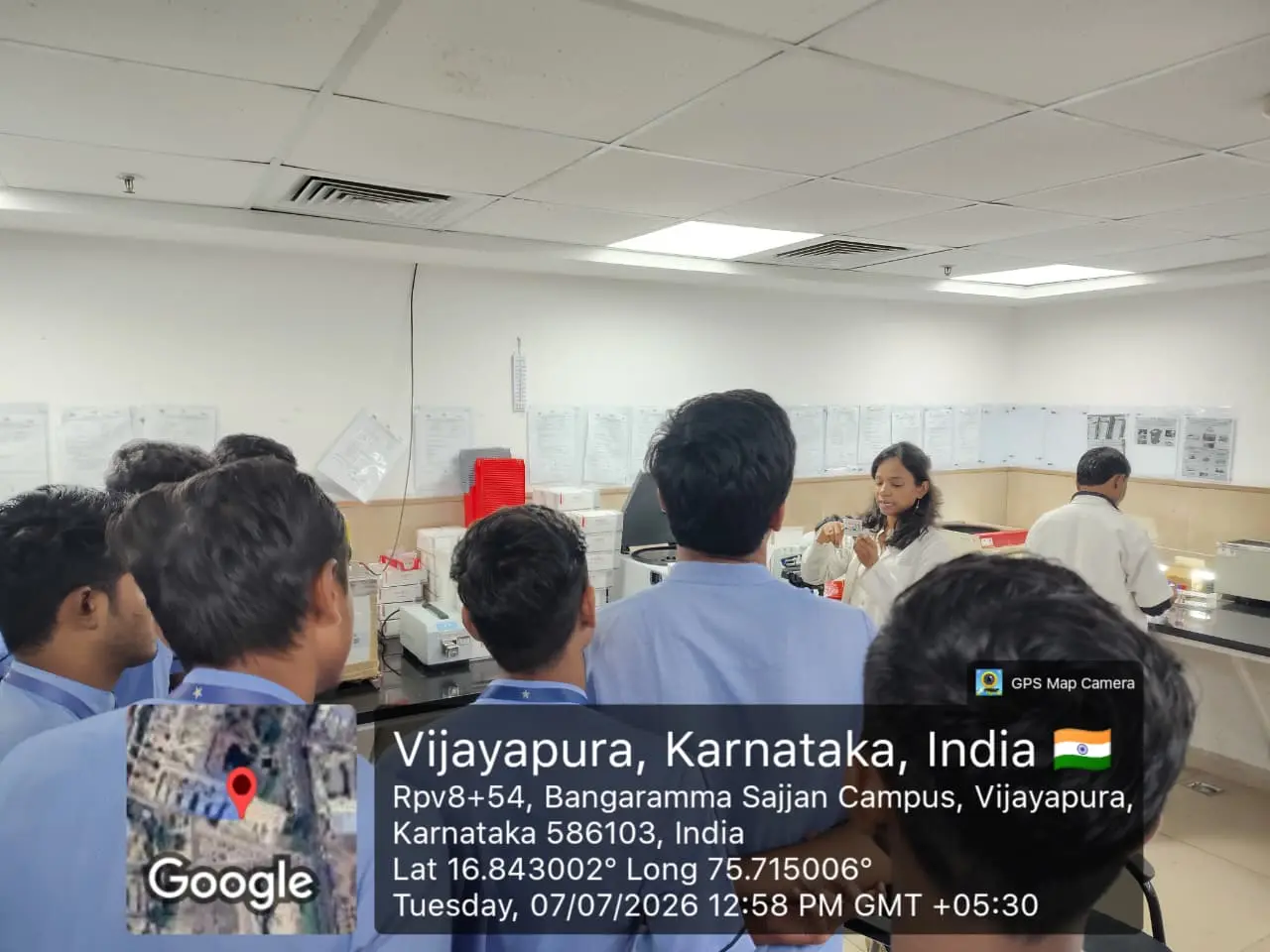 Faculty explaining biochemical investigation procedures to nursing students in Biochemistry Laboratory Shri B M Patil Medical College Vijayapura