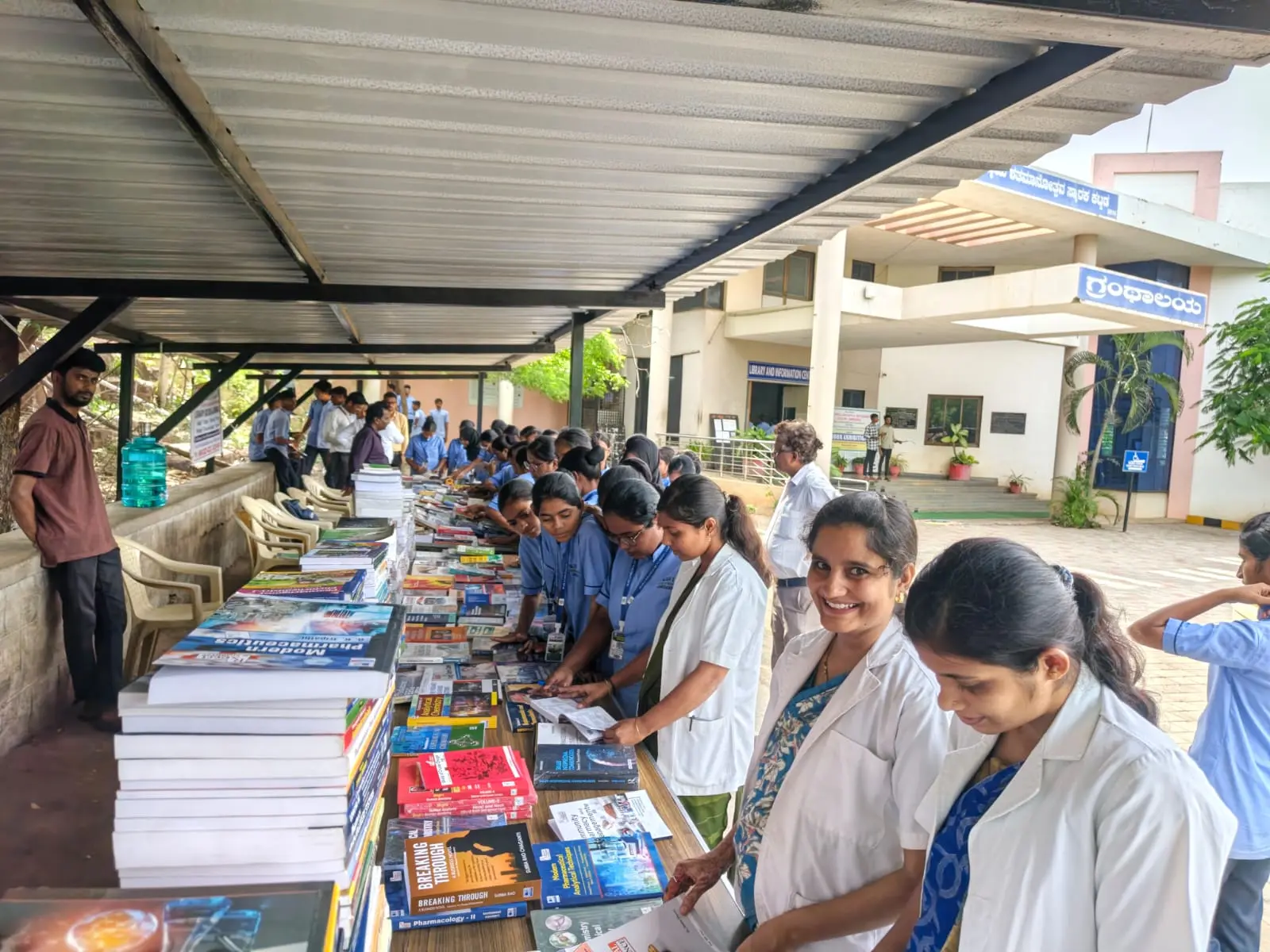 Group of B Sc Nursing students and library staff at Book Exhibition BLDE Central Library Jamkhandi August 2026
