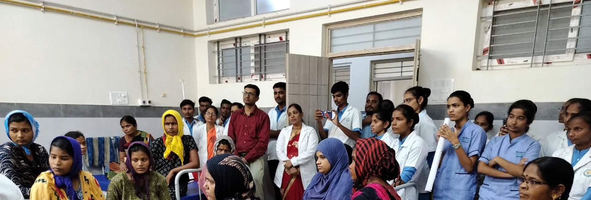 BSc Nursing students and faculty of BLDEAS College of Nursing Jamkhandi with antenatal and postnatal mothers during breastfeeding awareness program organized as part of World Breastfeeding Week at Taluka Hospital Jamkhandi on August 6 2024