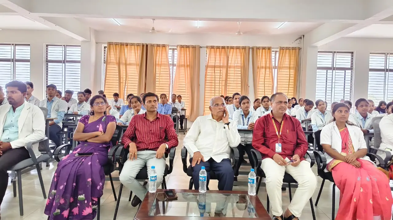 Prof S H Lagali Administrative Officer BLDE Association addressing students at CHN posting report presentation Jamkhandi