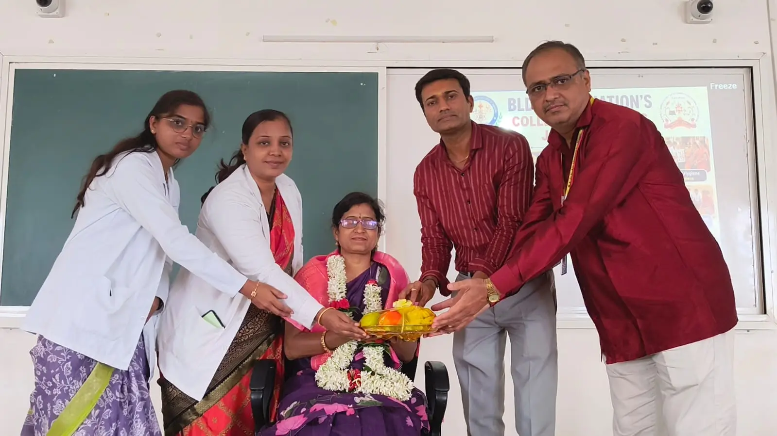 Dignitaries felicitating Community Health Nursing students after clinical posting report presentation Jamkhandi College of Nursing August 2026