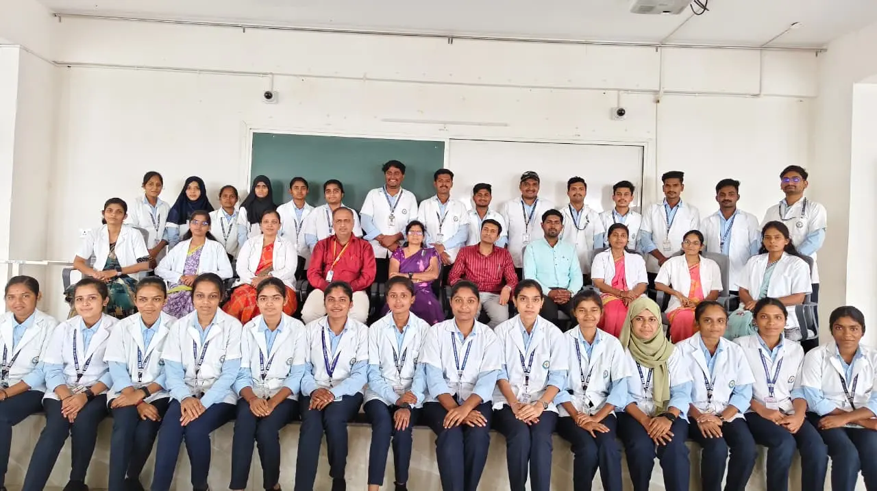 Group photograph of Fifth and Seventh Semester B Sc Nursing students faculty and guests after CHN posting report presentation Jamkhandi