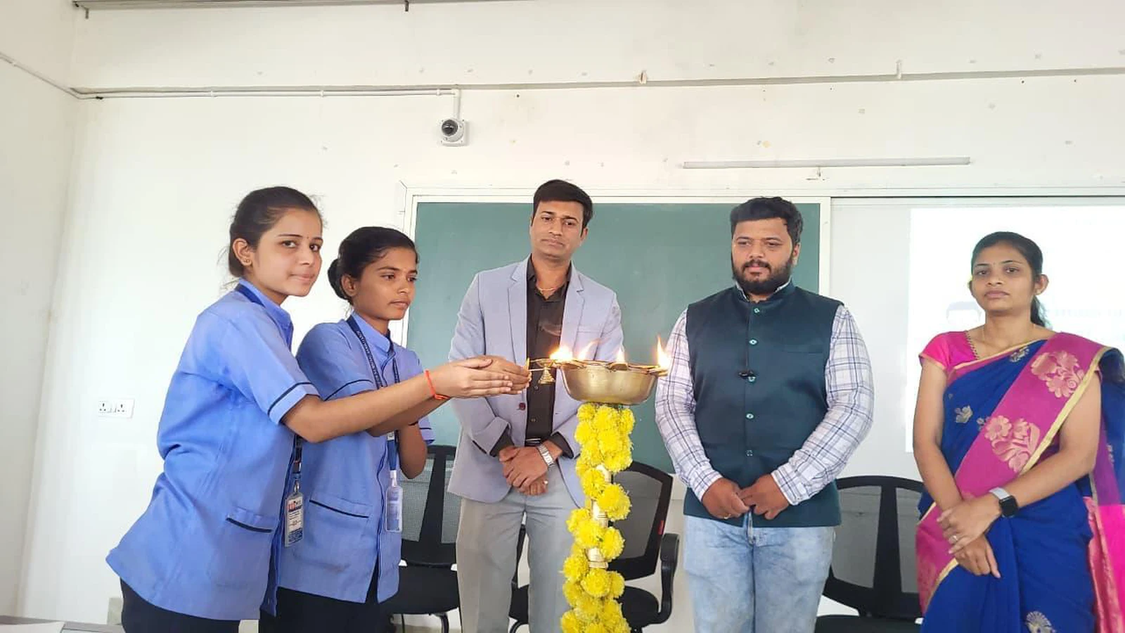 Lamp lighting ceremony inaugurating Seminar on Financial Literacy and Cyber Fraud Awareness at BLDEA College of Nursing Jamkhandi