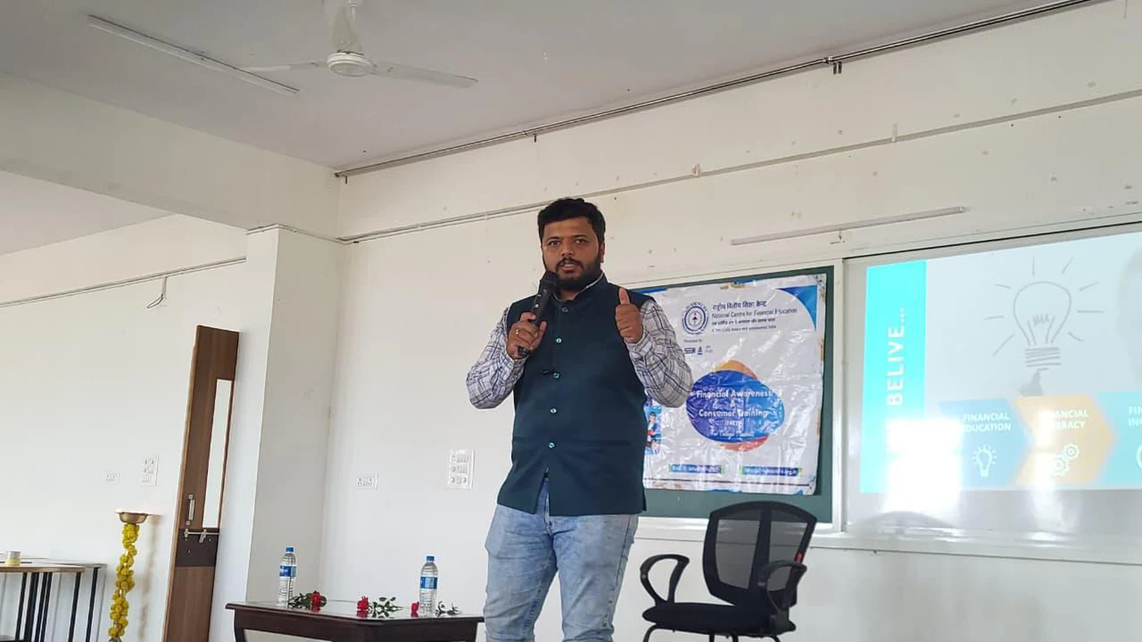 Mr. Srinath Kulkarni SEBI trainer presenting on safe financial practices and cyber fraud prevention at BLDEA College of Nursing Jamkhandi