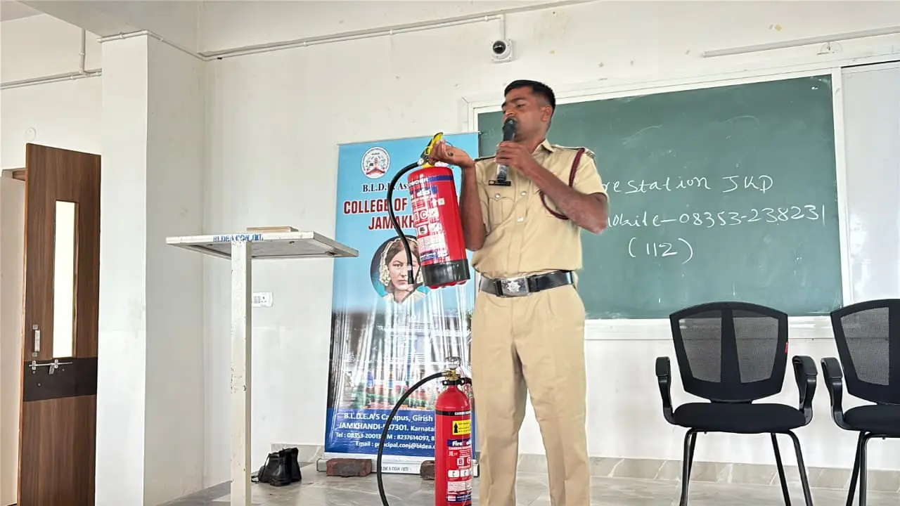 Karnataka State Fire and Emergency Services officer explaining fire extinguisher types to nursing students Jamkhandi