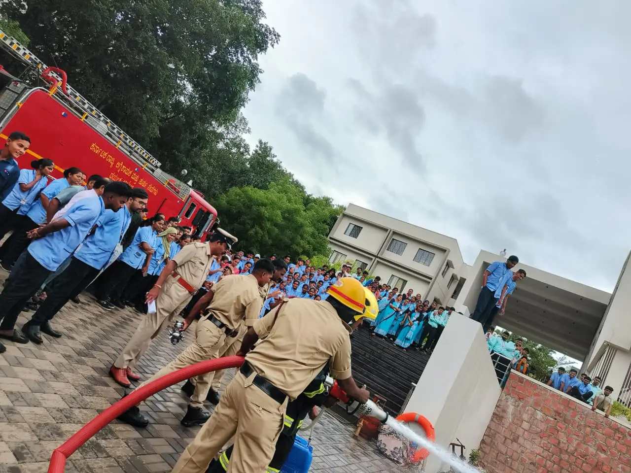 Fire and Emergency Services officers felicitated by Principal BLDEA College of Nursing after fire safety guest lecture Jamkhandi