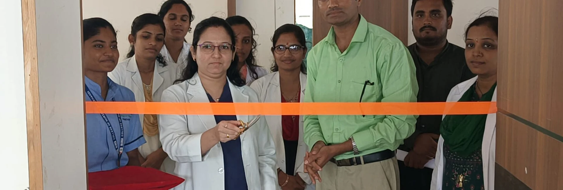 Dr Deepa Udagatti Consultant Ophthalmologist MM Joshi Eye Institute Jamkhandi and Dr Veerabhadrappa Mendagudli Principal BLDEAS College of Nursing Jamkhandi inaugurating Free Eye Screening Camp with ribbon-cutting ceremony at Seminar Hall BLDEAS College of Nursing Jamkhandi on September 4 2024 National Eye Donation Week in collaboration with MM Joshi Eye Institute Jamkhandi
