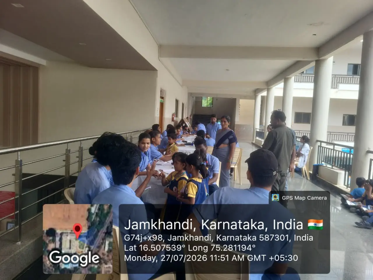 Group photograph of B Sc Nursing students and school children after free health checkup camp BLDEA Public School Jamkhandi