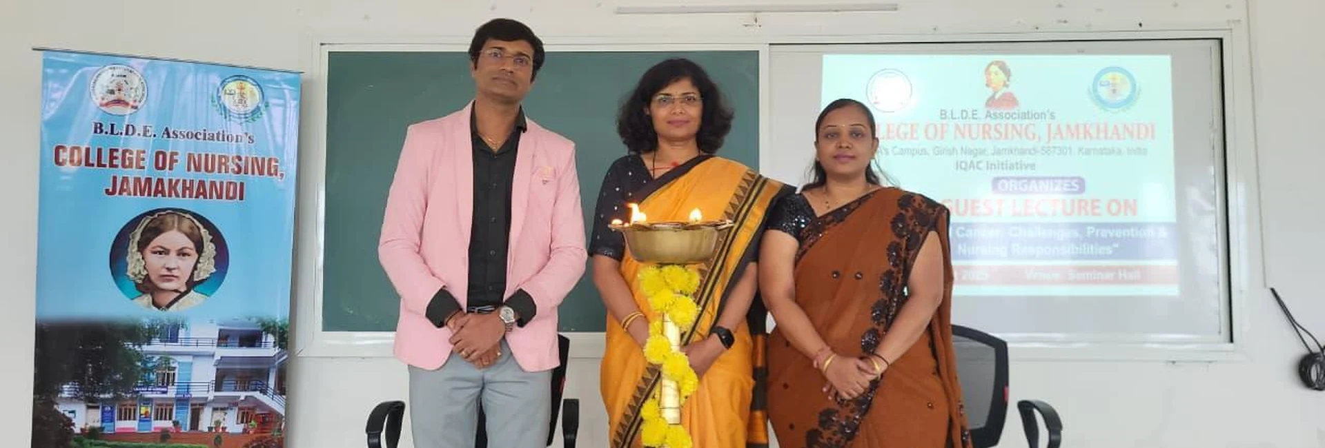 Faculty members and Dr Sangam Hebballi Consultant Haematologist Worcestershire Acute Hospitals NHS Trust UK lighting ceremonial lamp at inauguration of guest lecture on Blood Cancer at BLDEA College of Nursing Jamkhandi October 15 2025