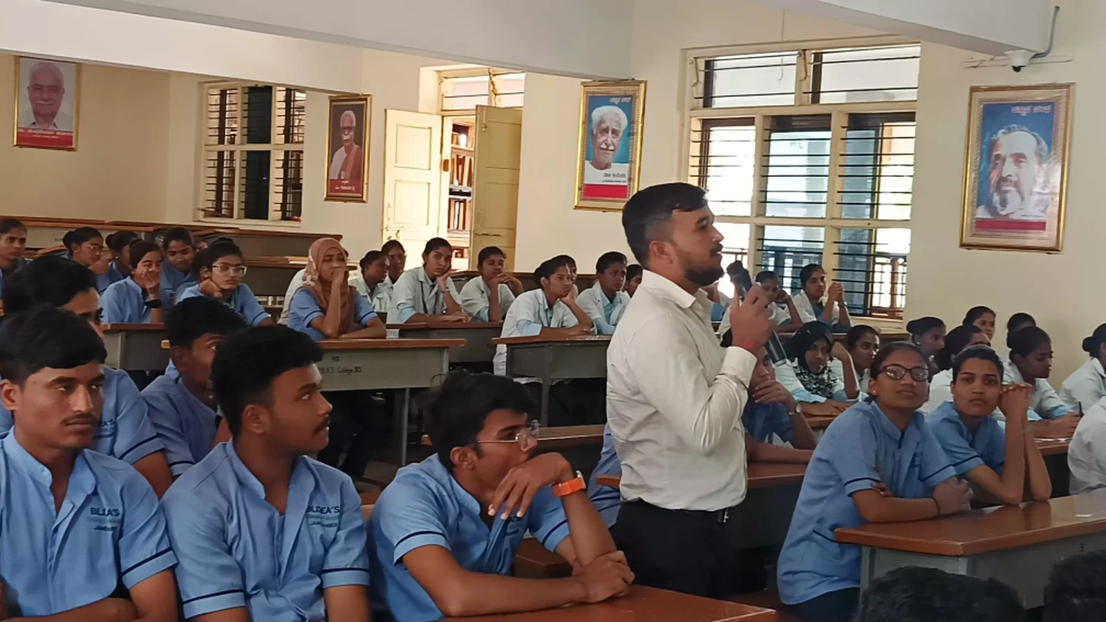BSc Nursing students and faculty members of BLDEAS College of Nursing Jamkhandi seated in classroom during interactive session of guest lecture on Building Resilience Strategies for Suicide Prevention and Stress Management by Mr Prashant Bevoor Psychiatric Registered Nursing Officer DIMHANS Dharwad at BLDEAS College of Nursing Jamkhandi September 21 2024