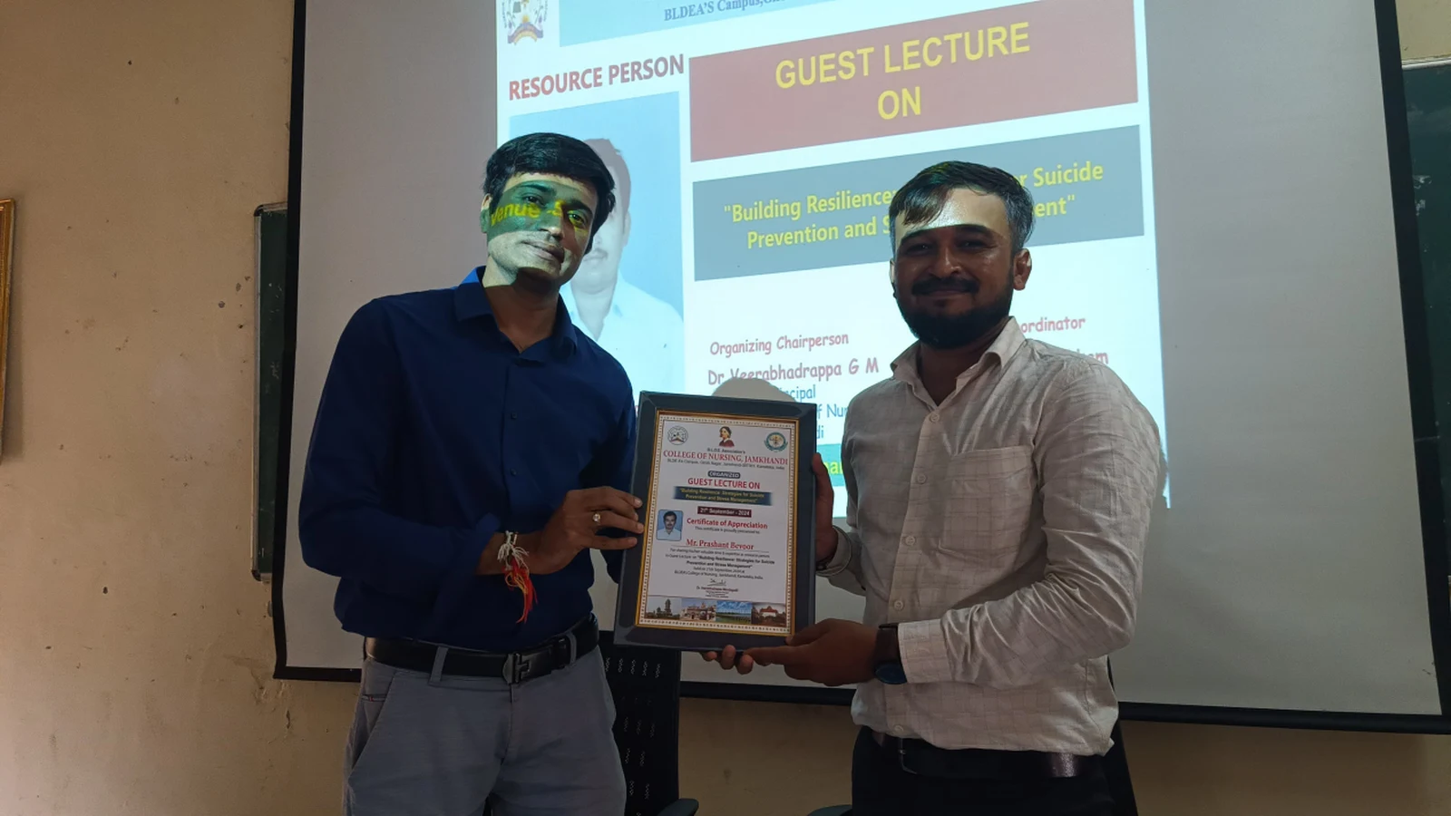 Mr Prashant Bevoor Psychiatric Registered Nursing Officer DIMHANS Dharwad receiving certificate of appreciation and memento at conclusion of guest lecture on Building Resilience Strategies for Suicide Prevention and Stress Management at BLDEAS College of Nursing Jamkhandi September 21 2024