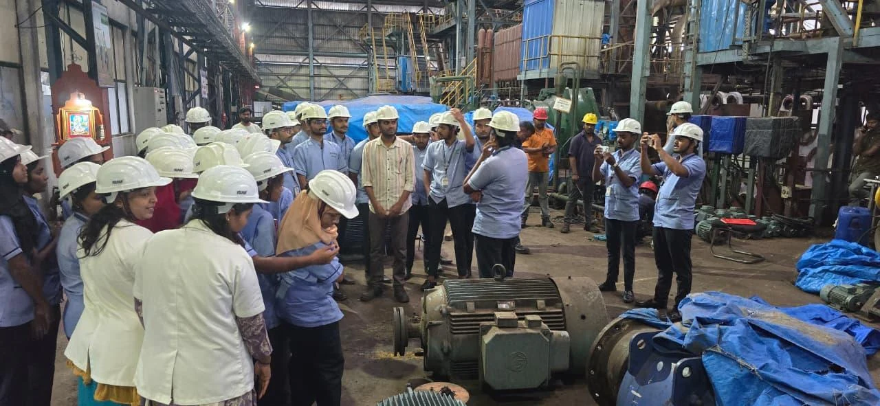Students observing sugar production equipment – Industrial Visit 2026, BLDEA College of Nursing Jamkhandi