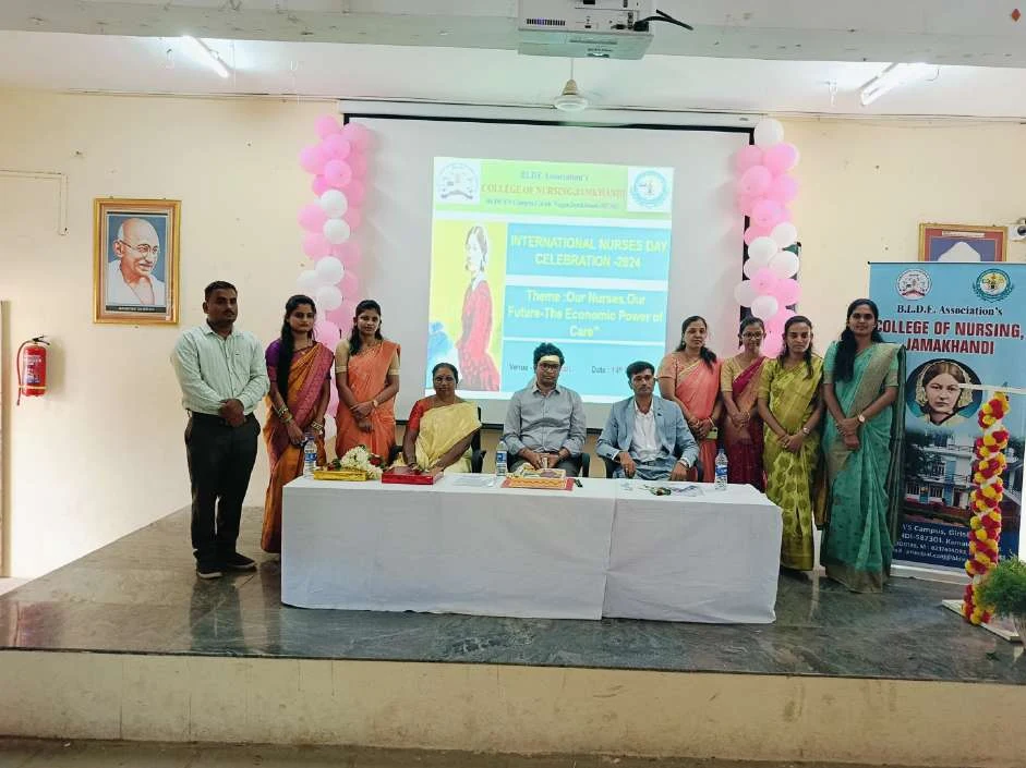 Group photo on stage with faculty – International Nurses Day 2024, BLDEA College of Nursing Jamkhandi