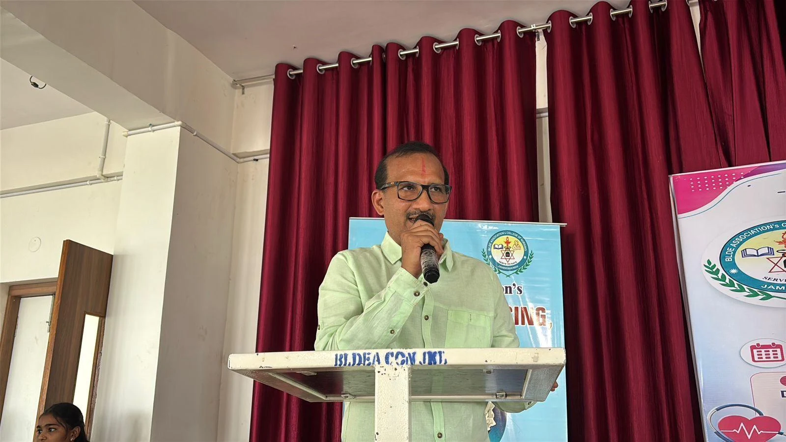 Chief Guest Dr. Mahesh G. Patil addressing the gathering – International Nurses Day 2026, BLDEA College of Nursing Jamkhandi