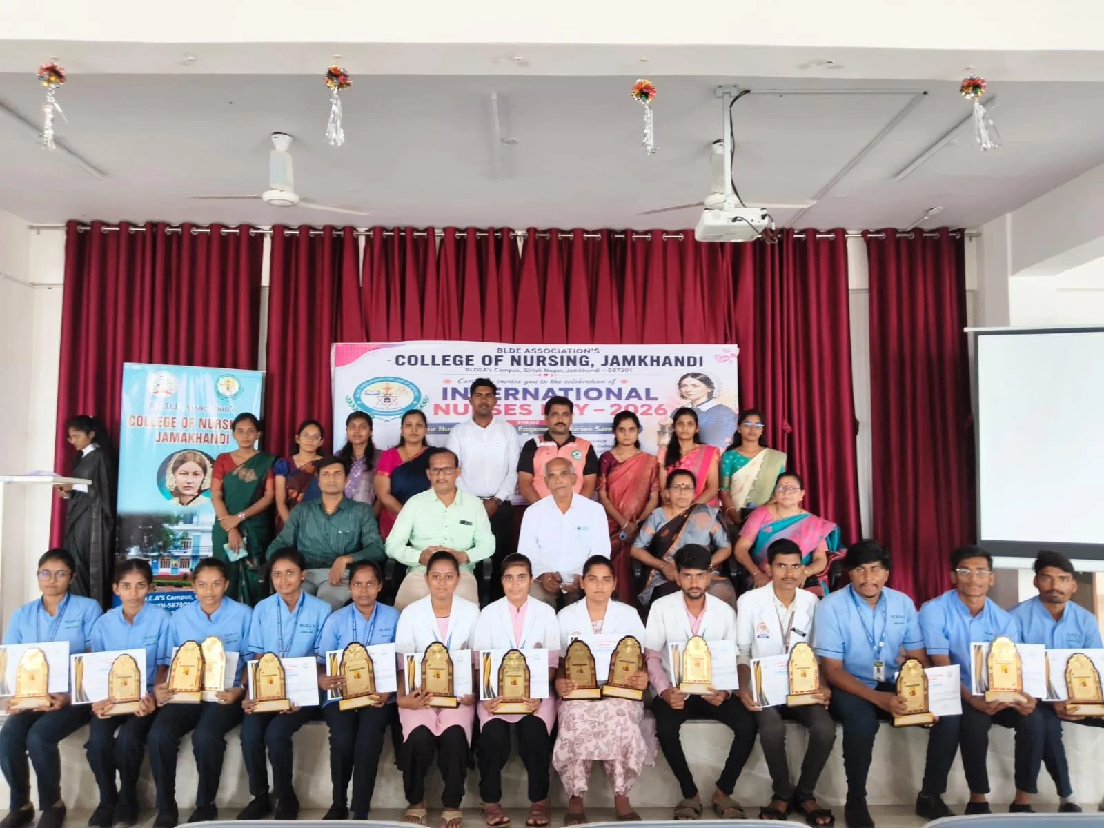 Group photo with all prize winners, dignitaries and faculty – International Nurses Day 2026, BLDEA College of Nursing Jamkhandi