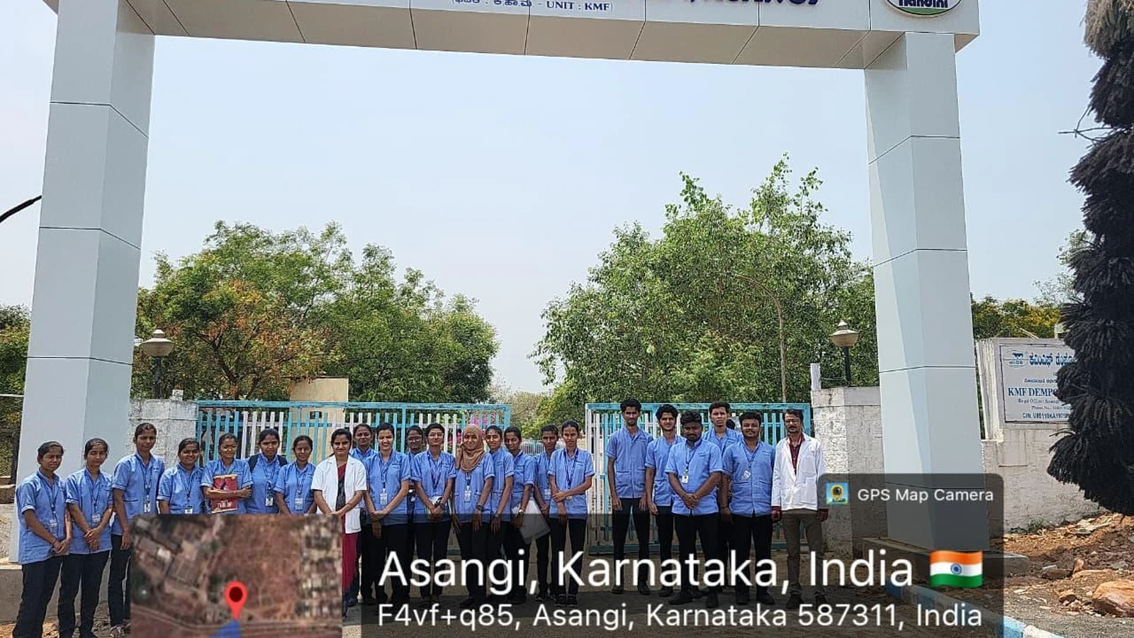 Group photo of nursing students and tutors at KMF Dempo Dairy Limited Asangi entrance – BLDEA College of Nursing Jamkhandi