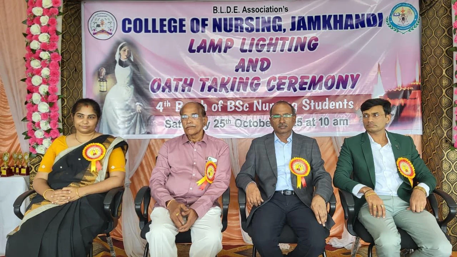 Dignitaries including Dr Raveendra Madraki Chief Guest Dr Sphurti Tungal and Prof S H Lagali seated at dais during Lamp Lighting and Oath Taking Ceremony 2025 for 4th Batch BSc Nursing students at BLDEA College of Nursing Jamkhandi October 25 2025