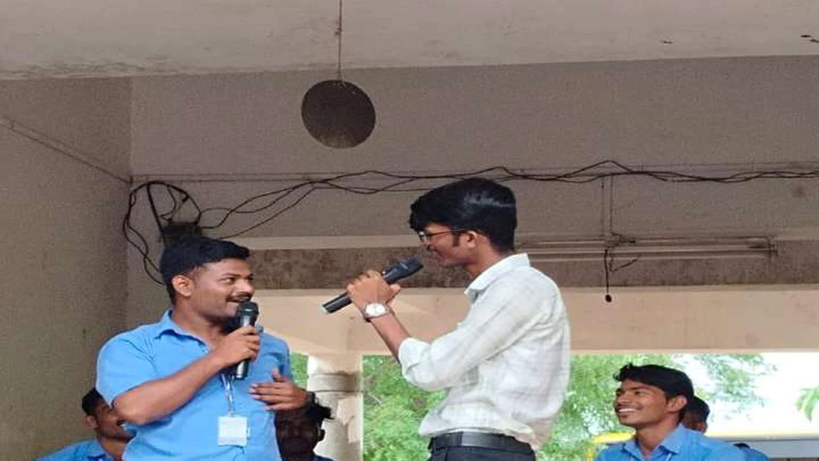 Third year BSc Nursing students of BLDEAS College of Nursing Jamkhandi performing comedy skit on stage to entertain elderly residents of Jain Vrudhrashram Jamkhandi during cultural program July 18 2024