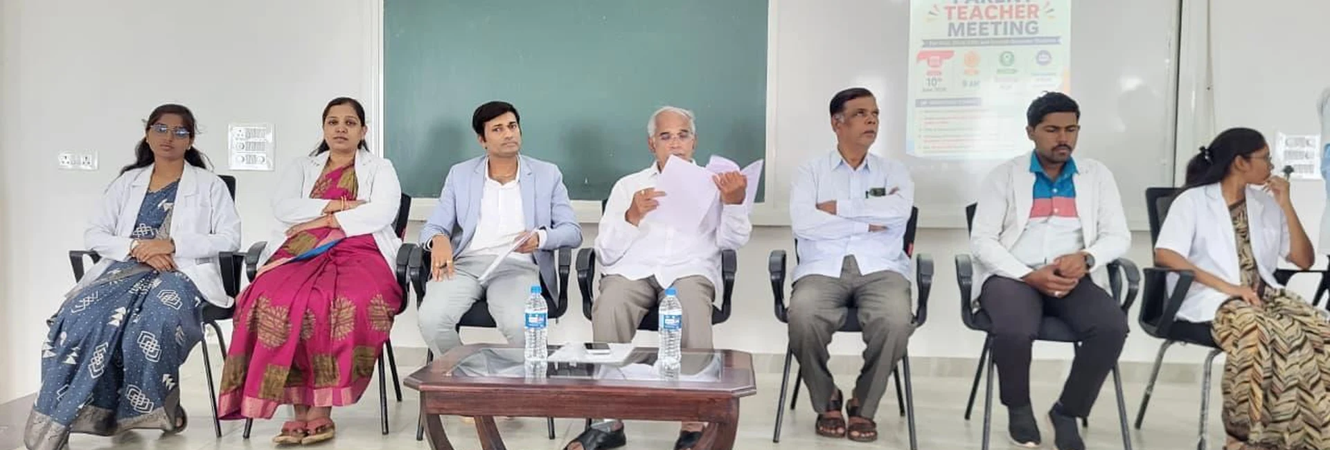 Panel of dignitaries including Dr Veerabhadrappa G M Principal and Prof S H Lagali Administrative Officer BLDE Association seated for Parent-Teacher Meeting at BLDEA College of Nursing Jamkhandi June 2026