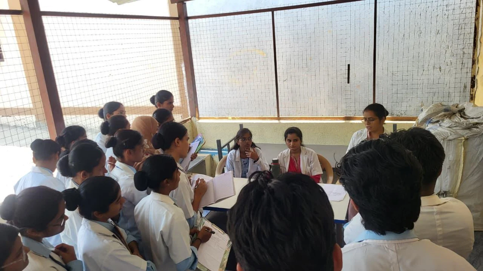 Students during orientation session with Mr. Sudhakar Golbhavi at PHC Konnur – Educational Visit 2026, BLDEA College of Nursing Jamkhandi