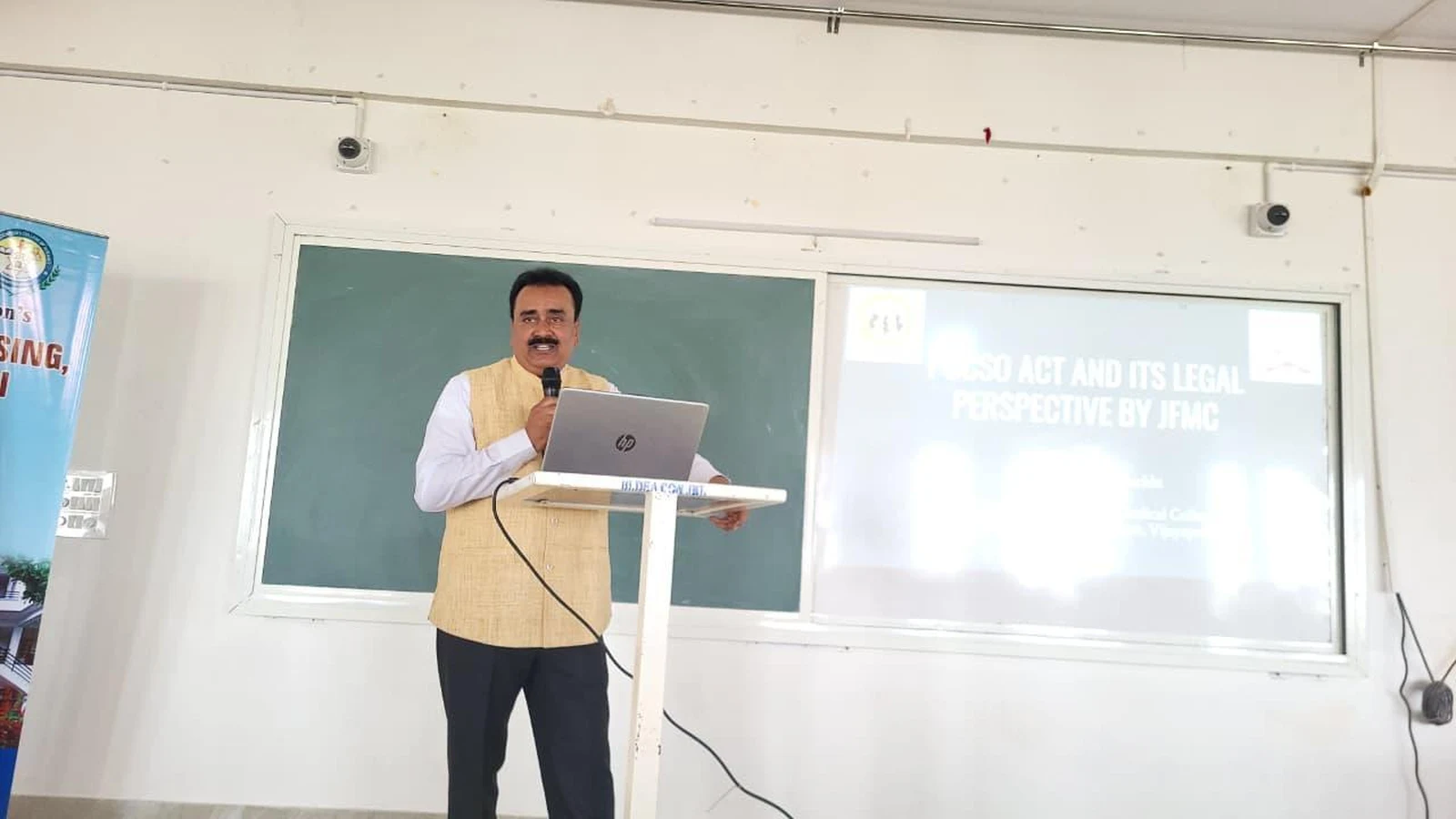 Dr. Udaykumar C. Nuchhi presenting on POCSO Act and its legal perspective by JMFC at BLDEA College of Nursing Jamkhandi
