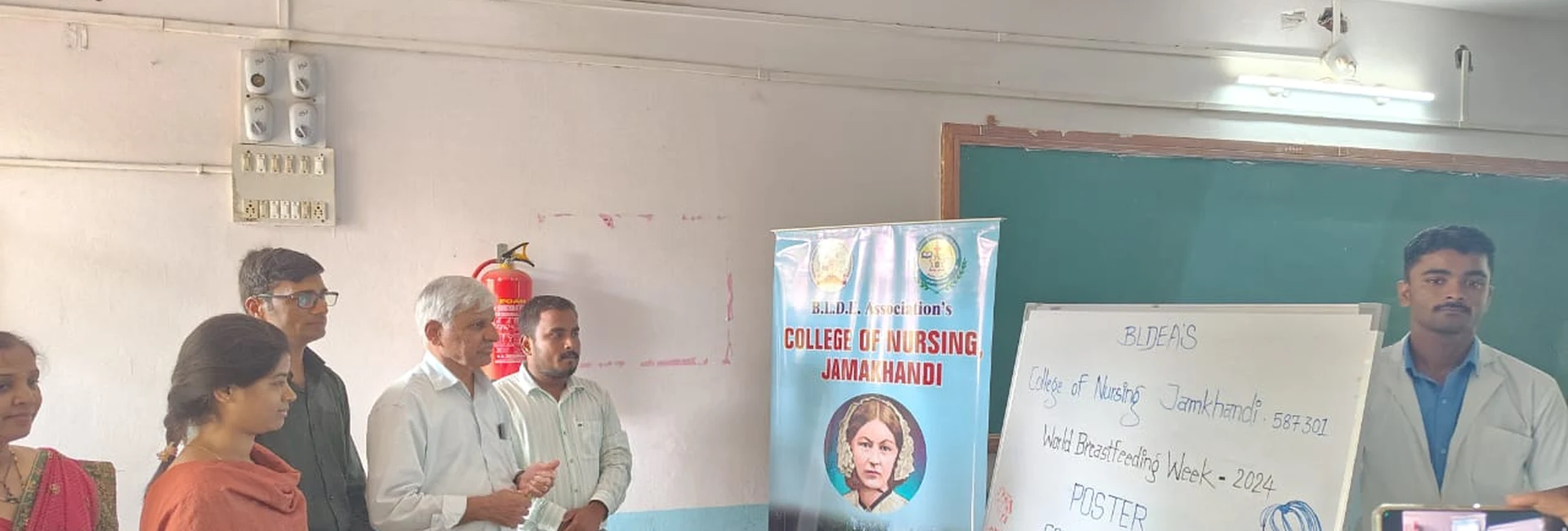 Dr H G Daddi Cardiologist Daddi Hospital Jamkhandi and Dr Veerabhadrappa G Mendagudli Principal BLDEAS College of Nursing Jamkhandi with faculty and students at inauguration of World Breastfeeding Week Poster Competition on theme Closing the Gap Breastfeeding Support for All at BLDEAS College of Nursing Jamkhandi August 7 2024