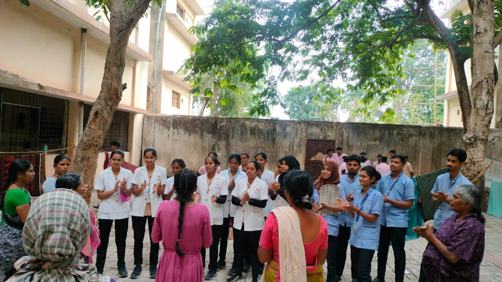 BLDEA College of Nursing Jamkhandi students and DIMHANS Dharwad patients participating in therapeutic recreational activity outdoor session during Psychiatric Clinical Posting May 2026