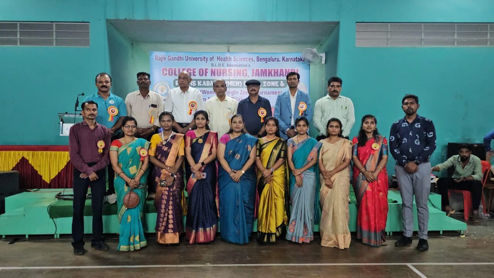 Dignitaries officials and BLDEA College of Nursing Jamkhandi faculty members group photograph at RGUHS Kabaddi Men Inter Zone and Women Single Zone Tournament cum Selection Trials 2025-26 prize distribution valedictory function