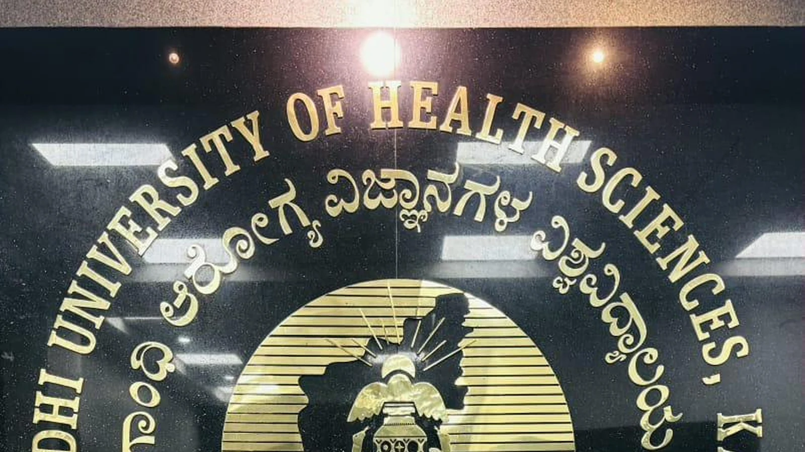 Ms. Vandana H. Chikaraddi Seventh Semester BSc Nursing BLDEA College of Nursing Jamkhandi holding medal and University Blue Honour certificate at RGUHS Bengaluru emblem