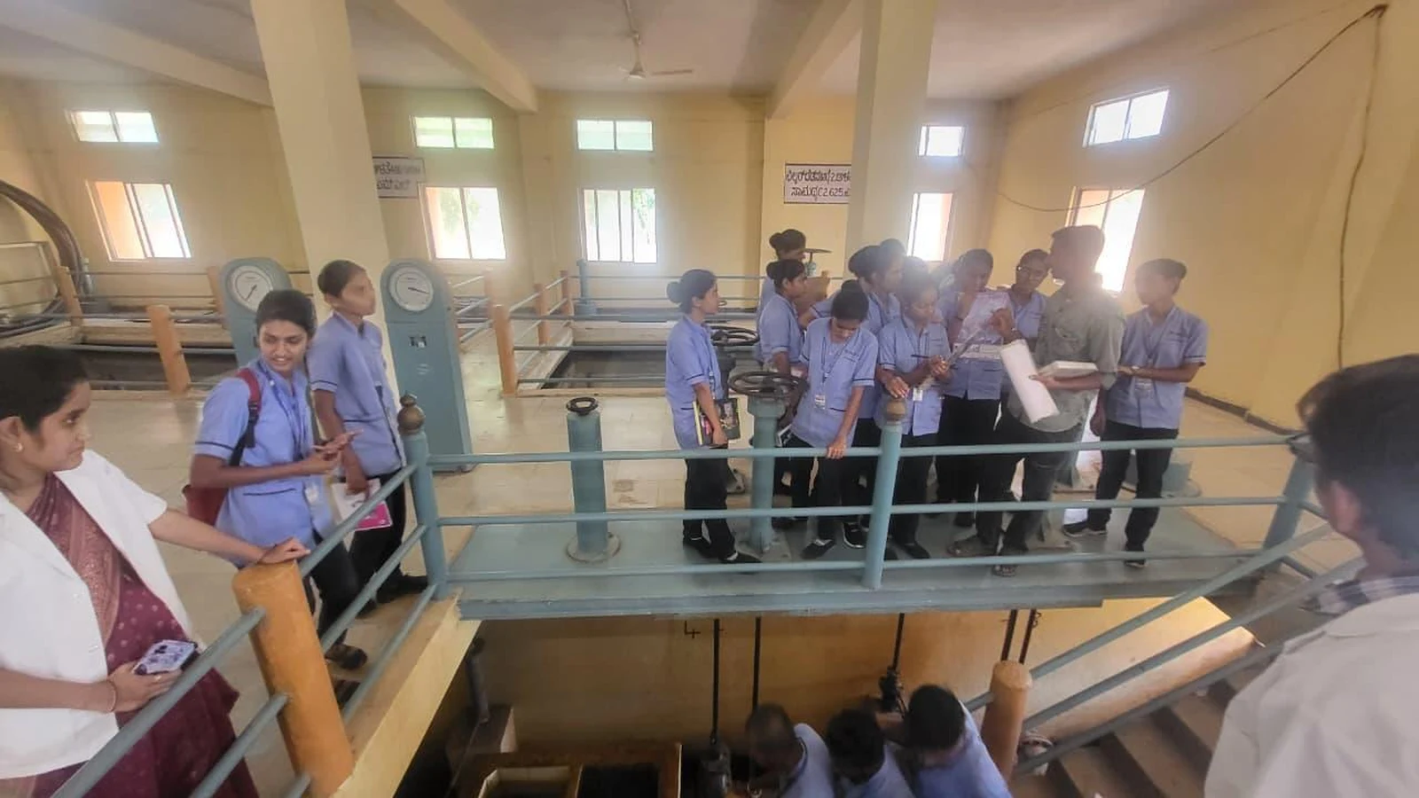 B.Sc. Nursing students observing pump machinery on walkway inside Water Purification Plant Jamkhandi – BLDEA College of Nursing