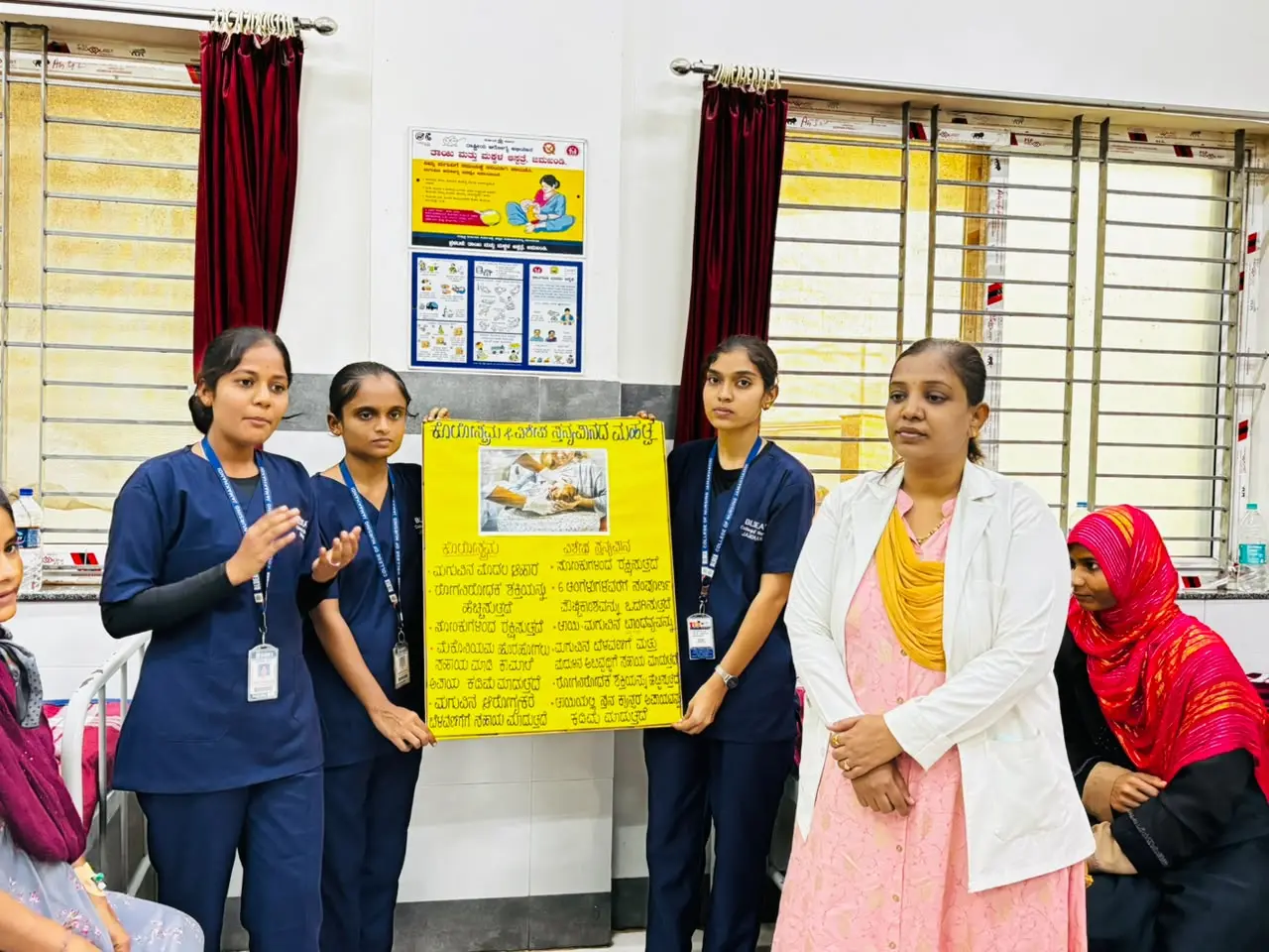 Eighth Semester B Sc Nursing student teaching Kangaroo Mother Care benefits to postnatal mothers Government Hospital Jamkhandi August 2026