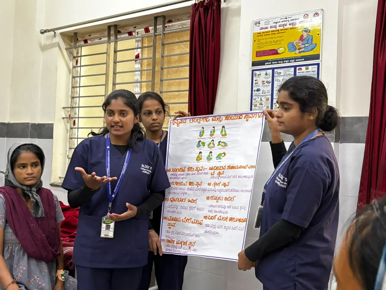 ANC and PNC mothers listening to breastfeeding awareness session conducted by nursing students Government Hospital Jamkhandi