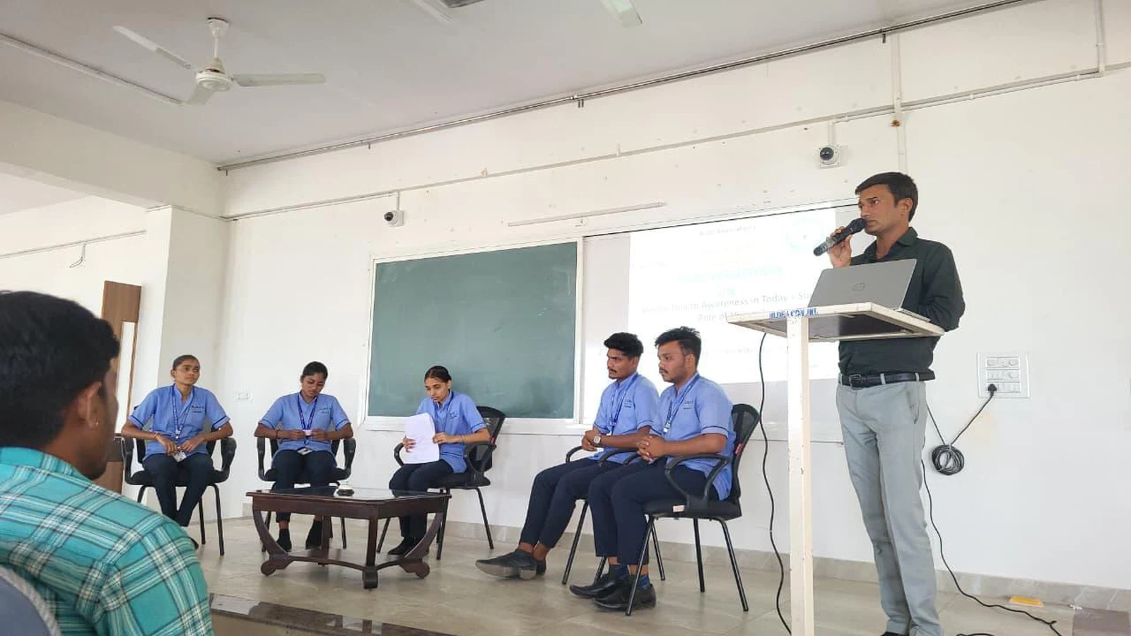 Principal Dr. Veerabhadrappa G. Mendagudli addressing panelists and audience at World Health Day 2026 – BLDEA College of Nursing Jamkhandi